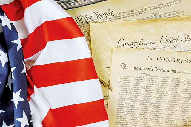 《美國獨立宣言》中載明人有生命、自由、追求幸福的權利等三大權利。Adobe Stock
