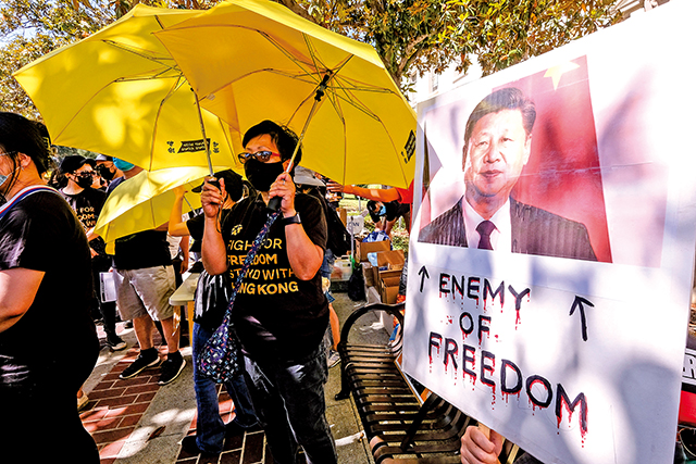 習近平以《大陸法》來鎮壓政治異己人士，卻又用《普通法》來維持香港原來的經濟活動，可謂「一港兩制」。Getty Images